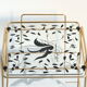 Side table in gilded brass