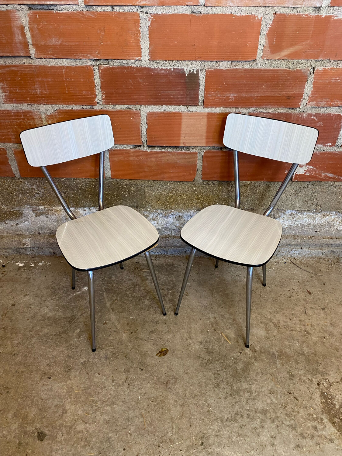 Pair of antique chrome metal chairs + white formica seat & back