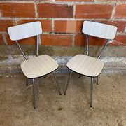 Pair of antique chrome metal chairs + white formica seat & back