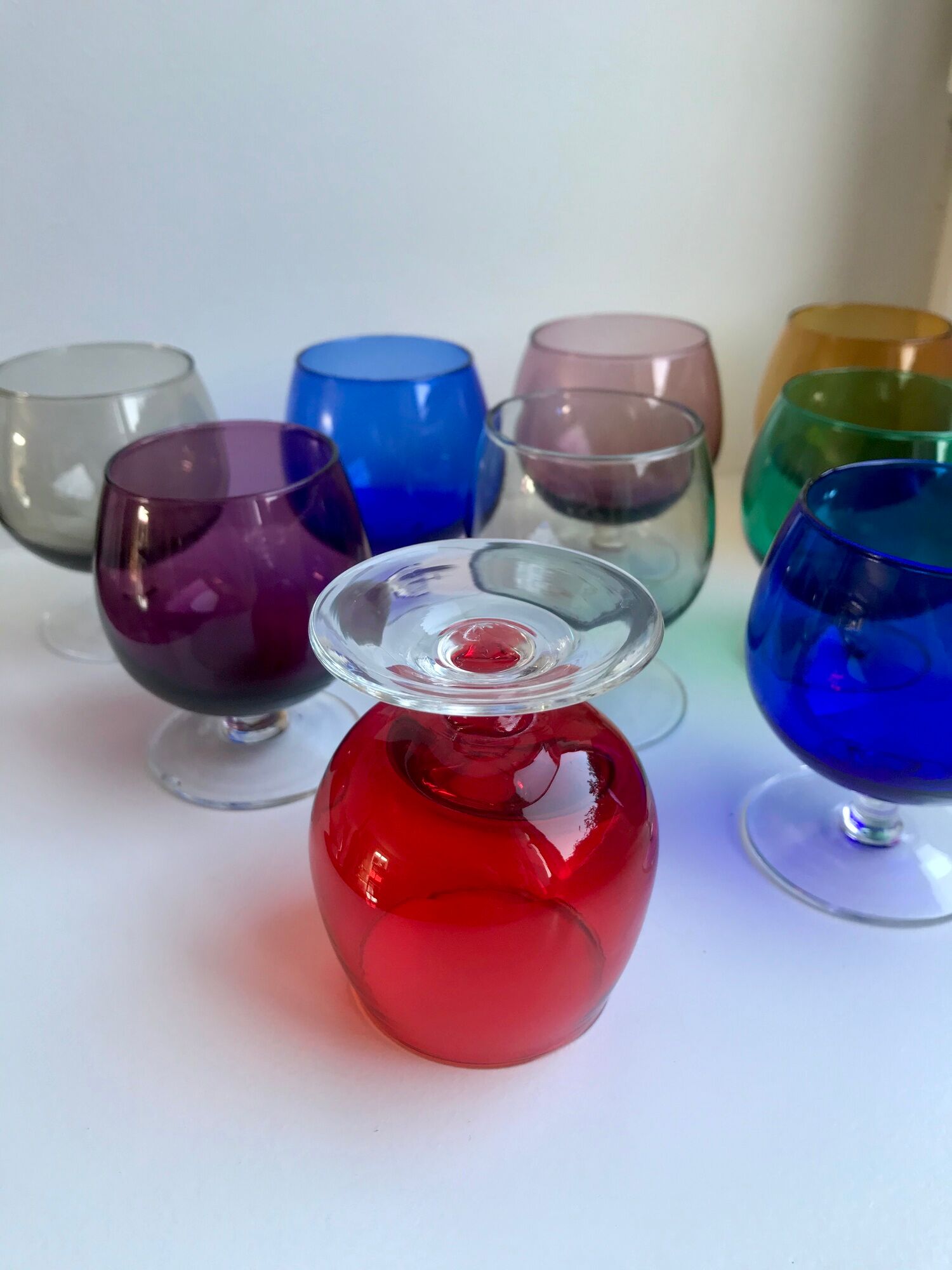 Set of 9 glasses with colored feet in blown glass 50s