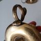 Antique hand candlestick in solid gilded brass.