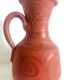 Pitcher in oriental terracotta