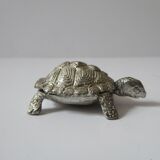 Small box in the shape of a silver metal turtle