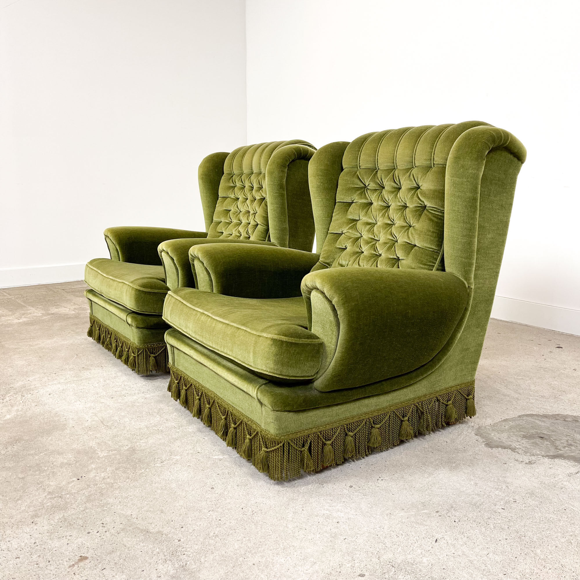 Set of two vintage original green velvet armchairs