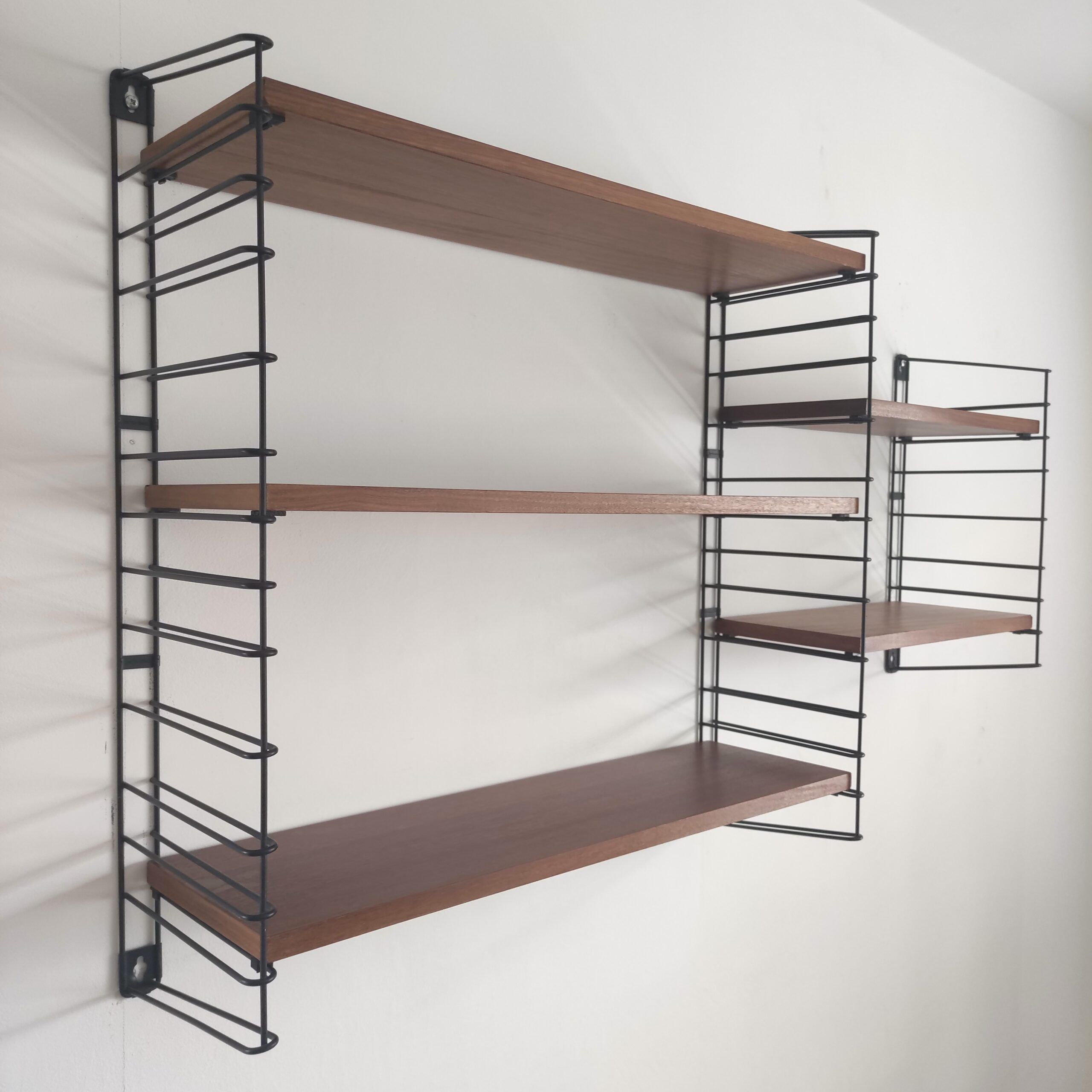 Tomado wall unit with wooden shelves by A. Dekker – Tomado