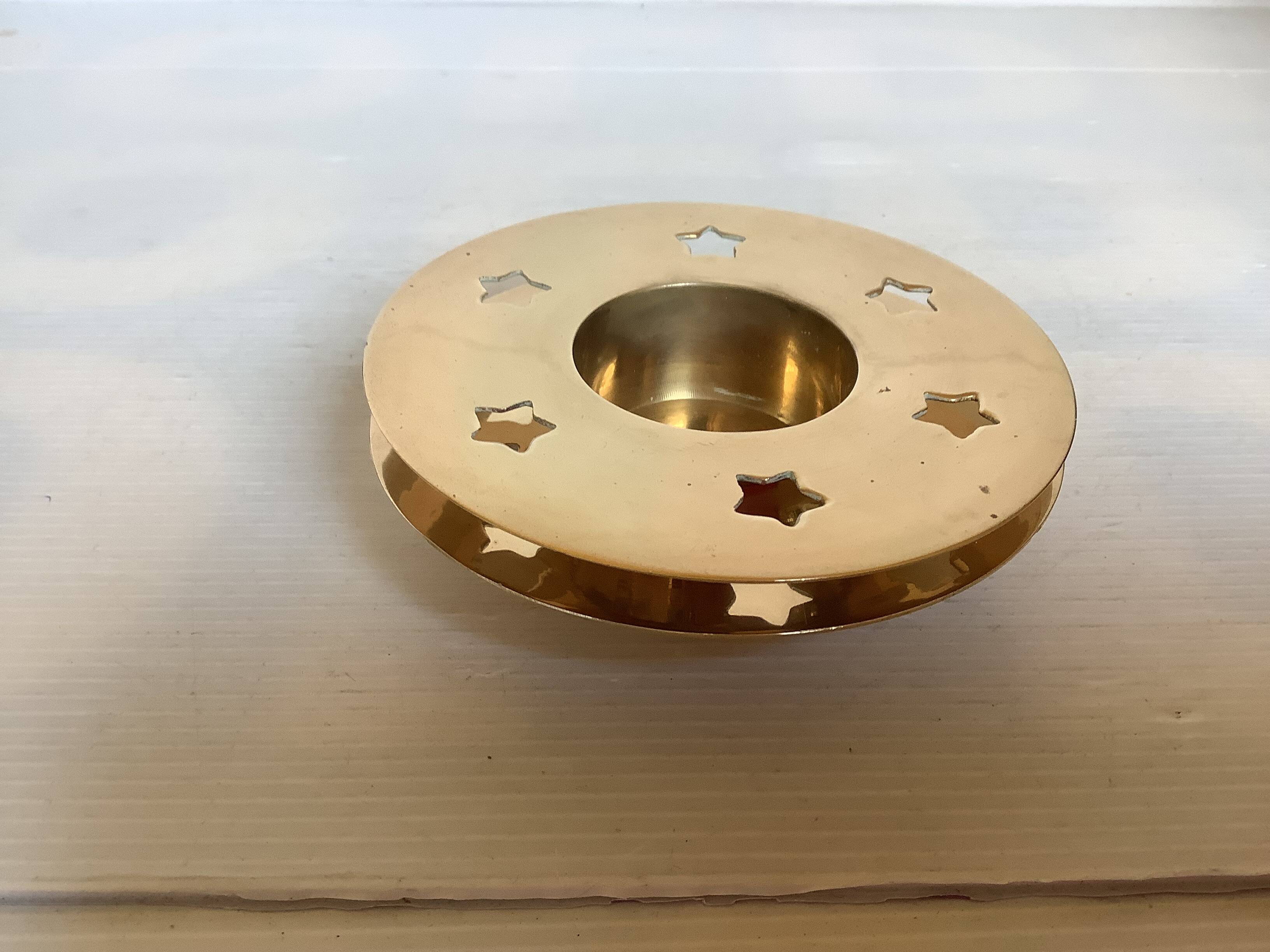 Pair of star candle holders in brass
