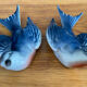 Old pair of porcelain birds for wall decoration.