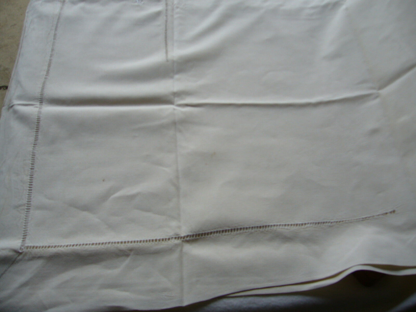 Old linen sheets embroidered with flowers