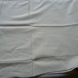 Old linen sheets embroidered with flowers