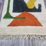 Handmade traditional Moroccan rug with colourful patterns, size 140x260 cm.