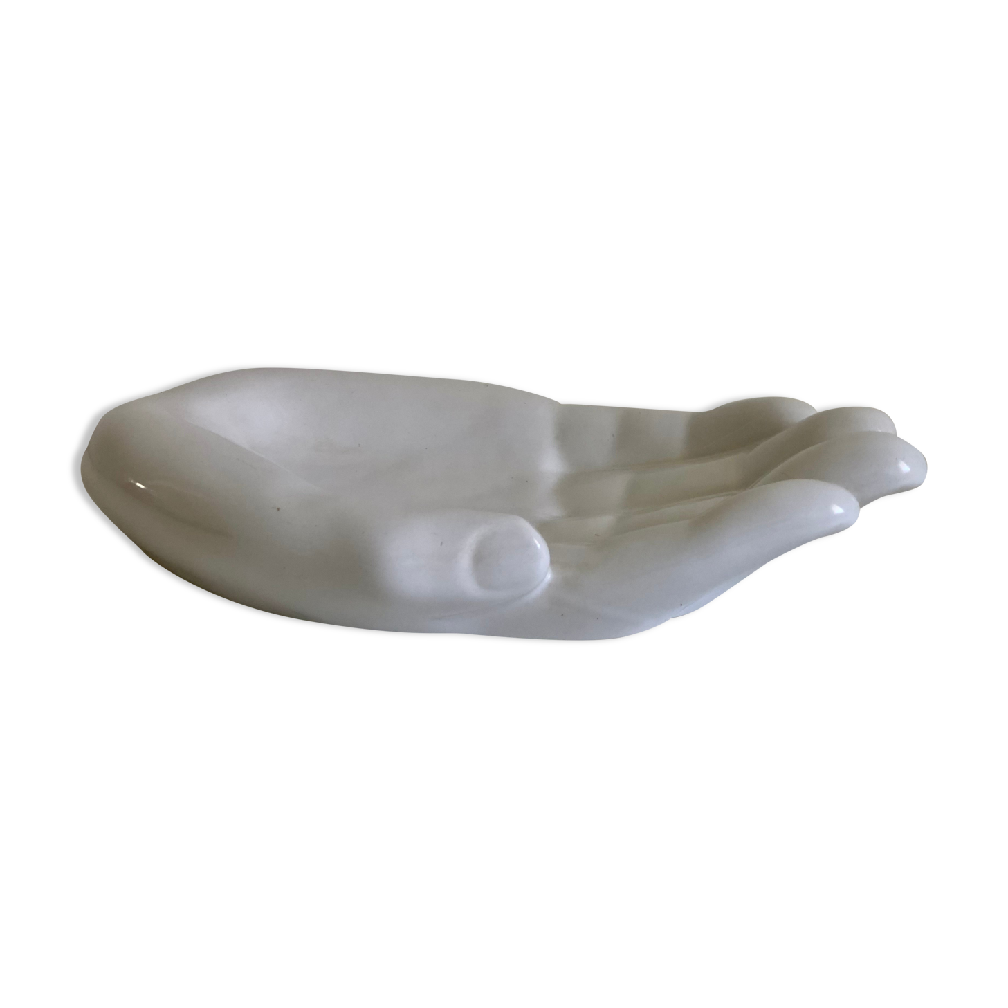 Empty white enamelled ceramic pocket in the shape of a large hand, 1990