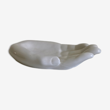 Empty white enamelled ceramic pocket in the shape of a large hand, 1990