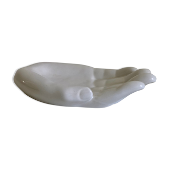 Empty white enamelled ceramic pocket in the shape of a large hand, 1990