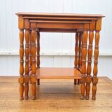 Set of 3 rustic cherry wood nesting coffee tables from the 1950s.