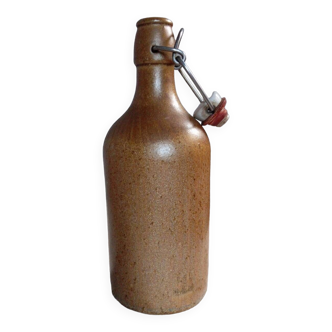 Small brown stoneware bottle, ceramic cap from mkm