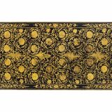 Lacquer coffee table decorated with floral motifs. Circa 1900.
