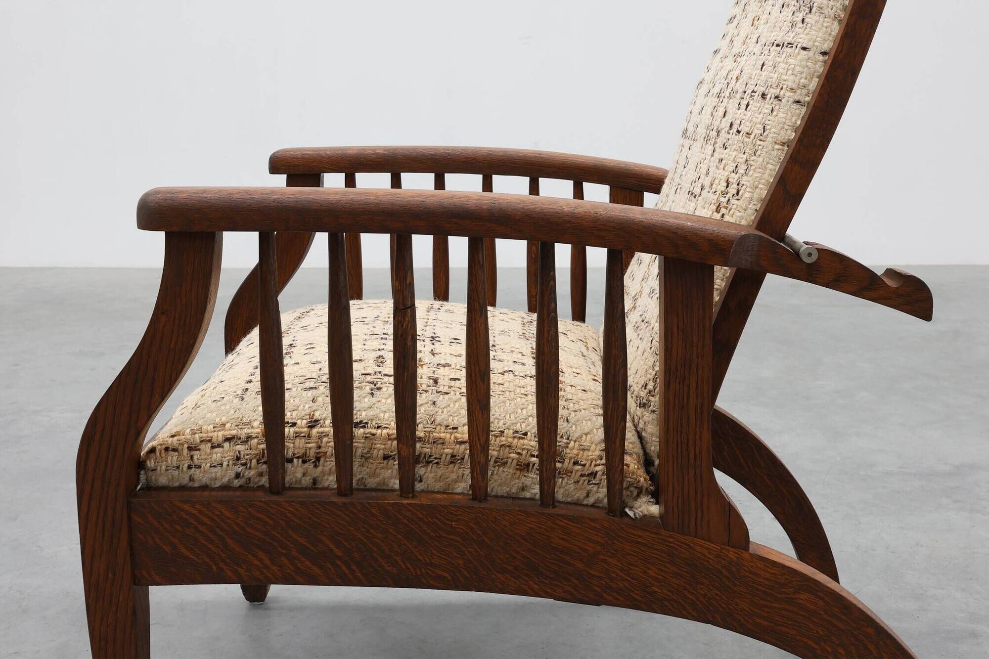 Arts & Craft oak armchair with spindle sides and tweed upholstery, Belgium