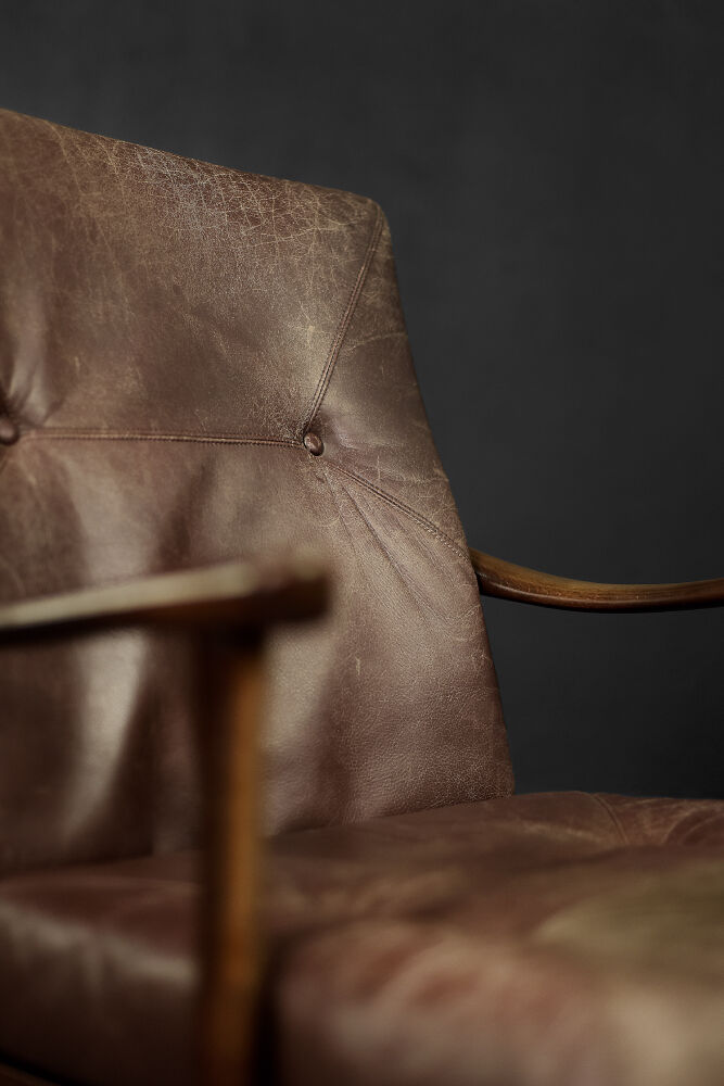 Modern vintage Danish armchair in beech and brown leather by Farstrup Møbler, 1970.