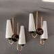 Pair of sconces in black metal and gilded brass 1960 Vintage.
