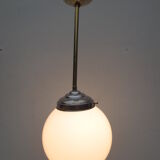 Old hanging lamp, brass stem and white opaline globe