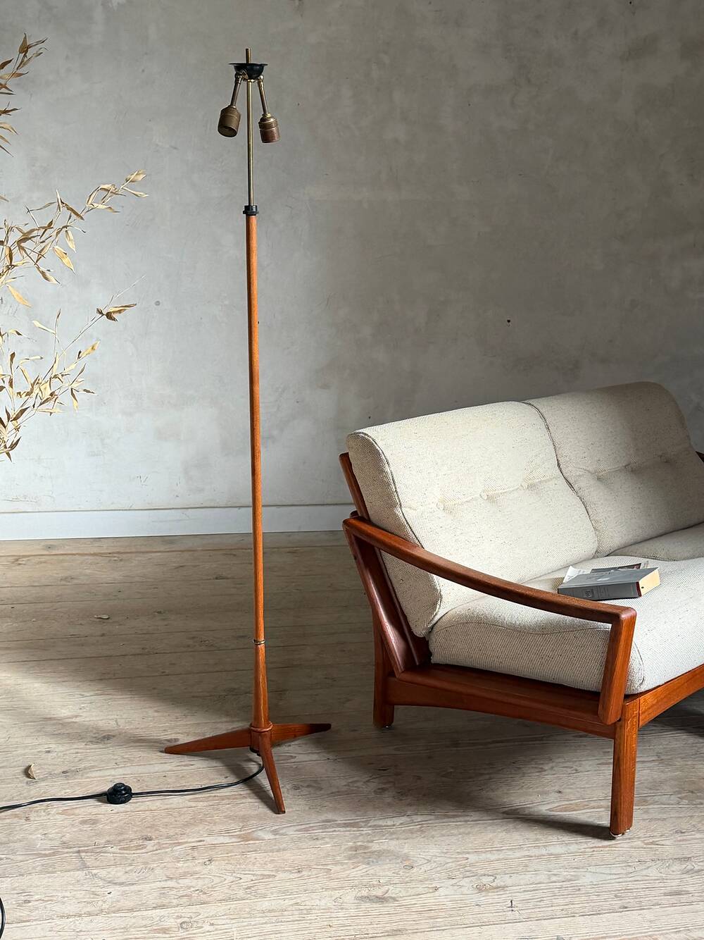 Scandinavian tripod reading lamp in teak and brass.