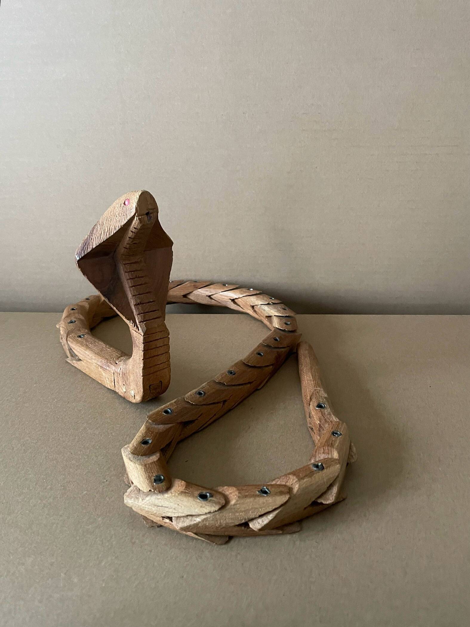 Articulated wooden snake