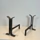 Pair of modernist and wrought iron fire dogs