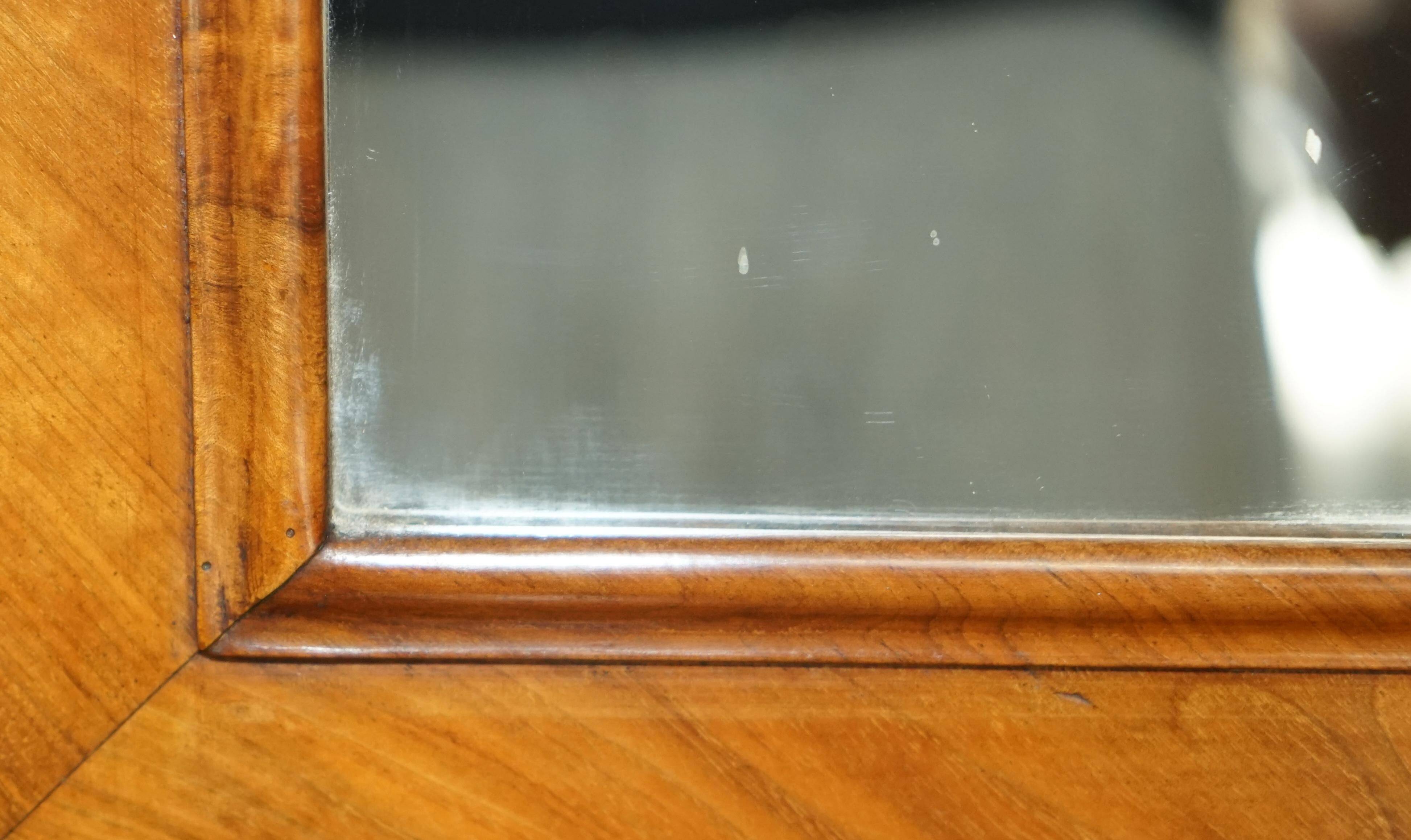 Pair of restored antique consoles from around 1815 in walnut, Regency style with mirror.