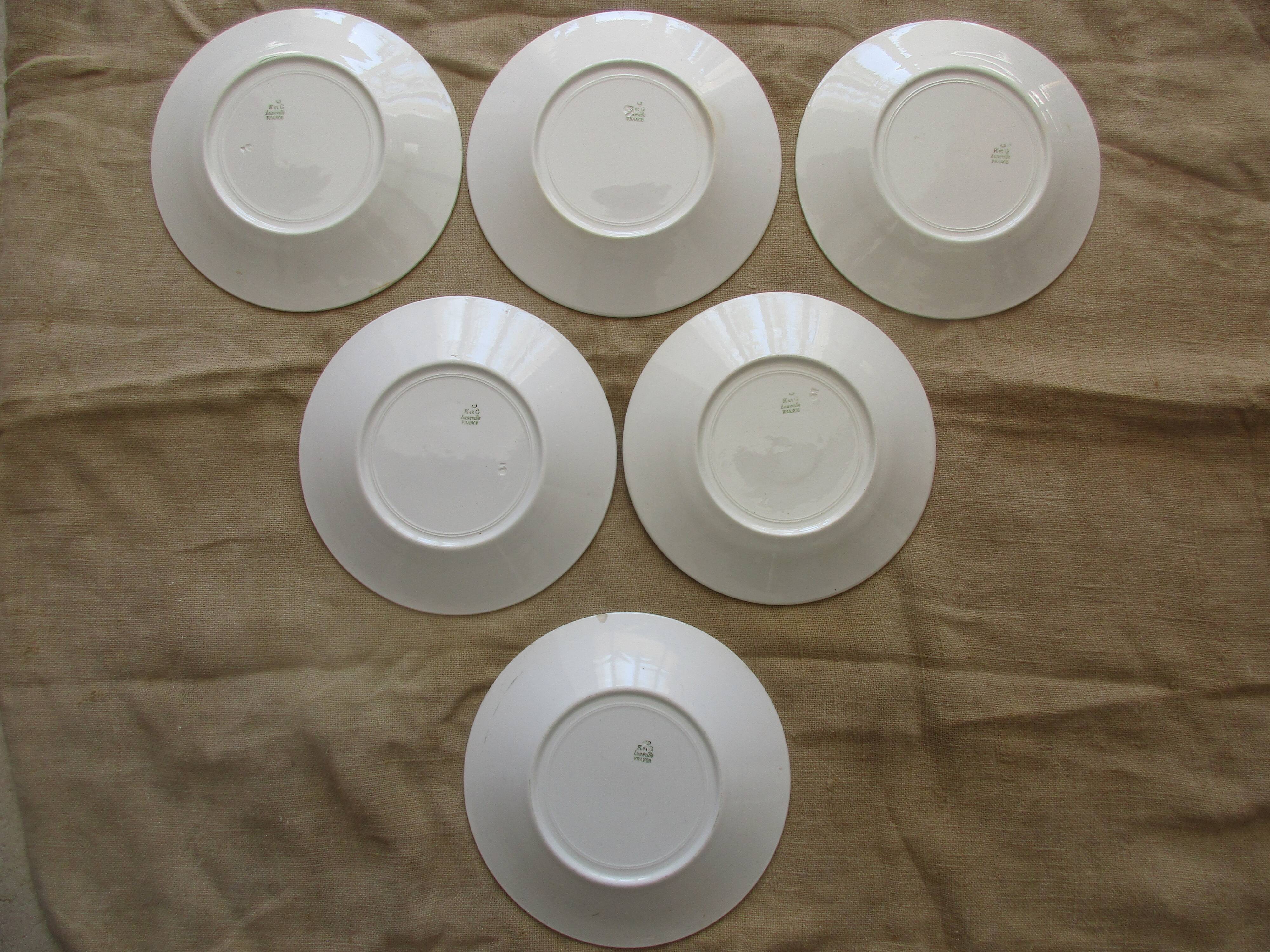 6 plates a decor floral and garland faiencerie de luneville