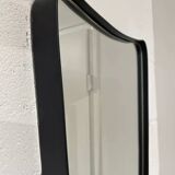 Free-form rearview mirror in black metal