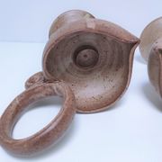Pair of vintage “heart” sandstone candlesticks