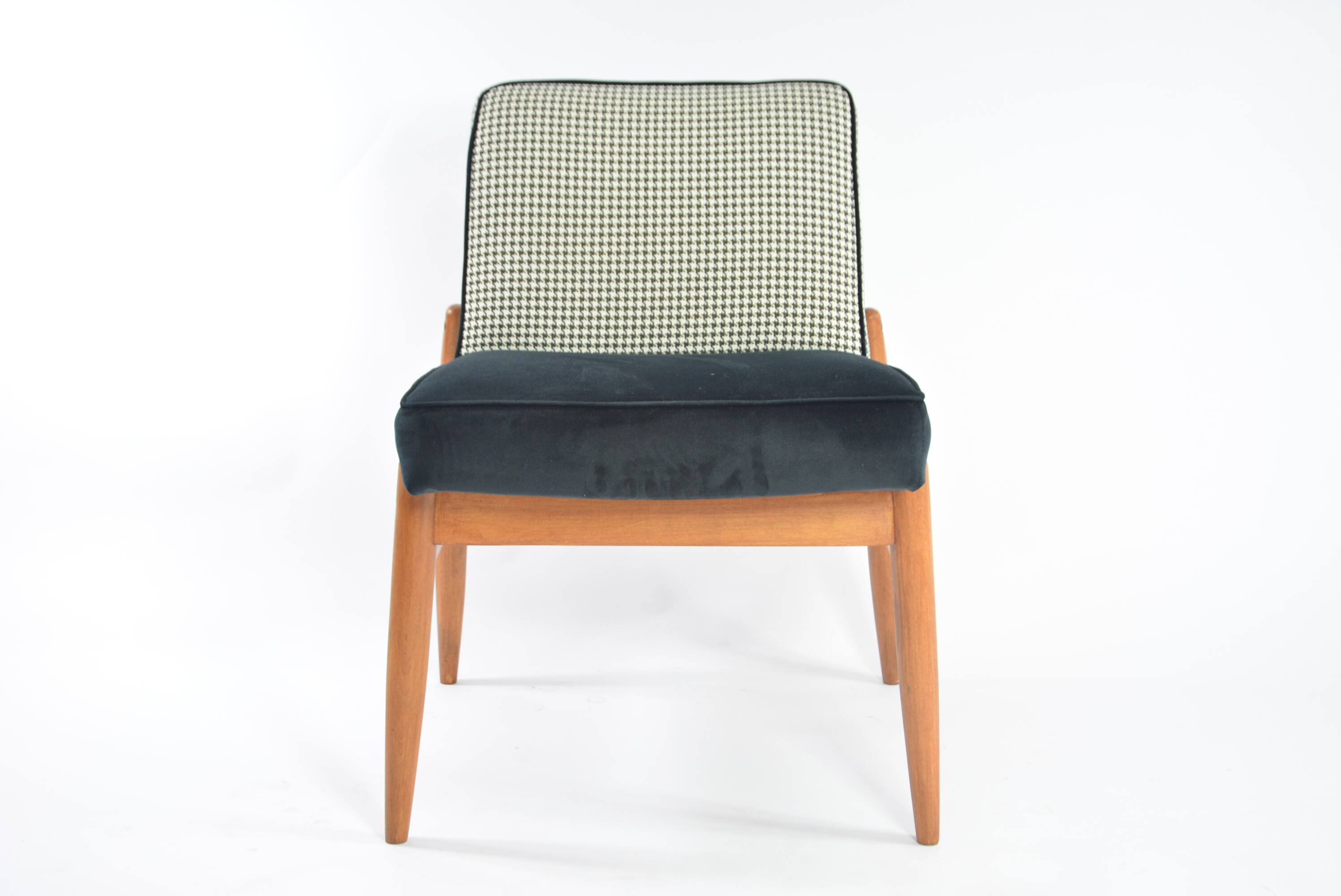 Black and white armchair without armrests
