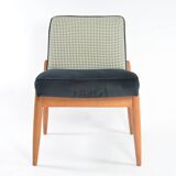 Black and white armchair without armrests