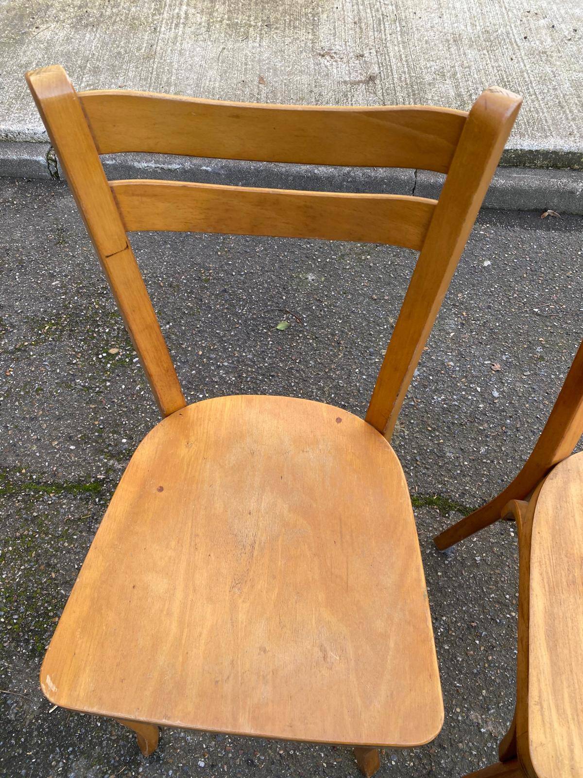 2 Scandinavian bistro chairs by Baumann in light wood from 1980.