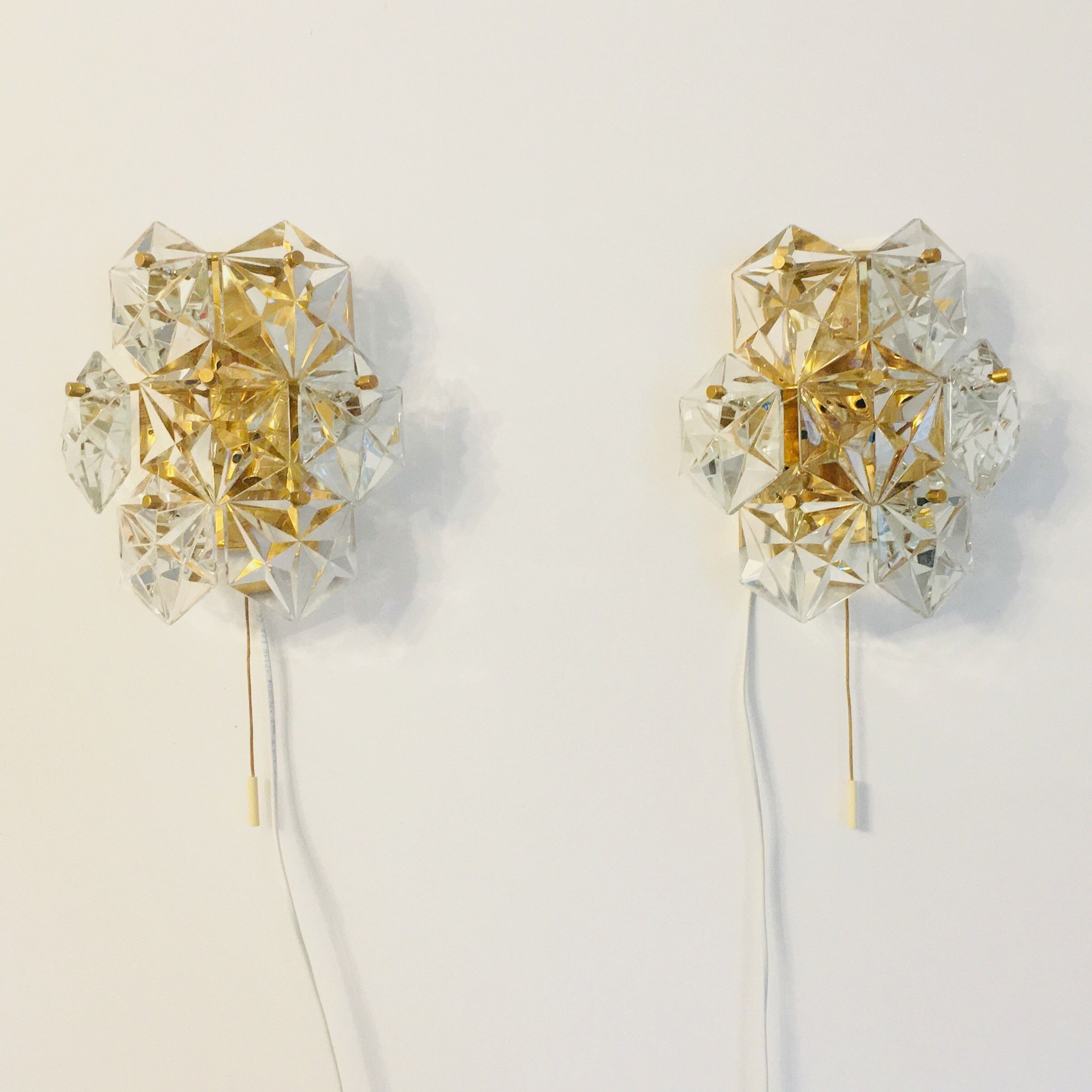 Pair of faceted crystal wall lights / sconces by Kinkeldey, Germany, 1970s