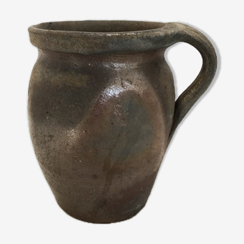 Old terracotta pot with handle
