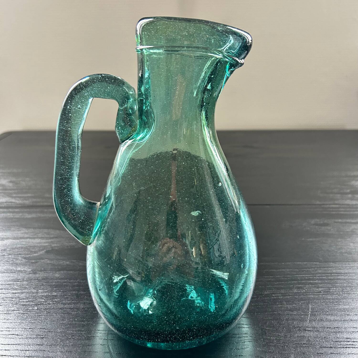 Bluish blown glass carafe