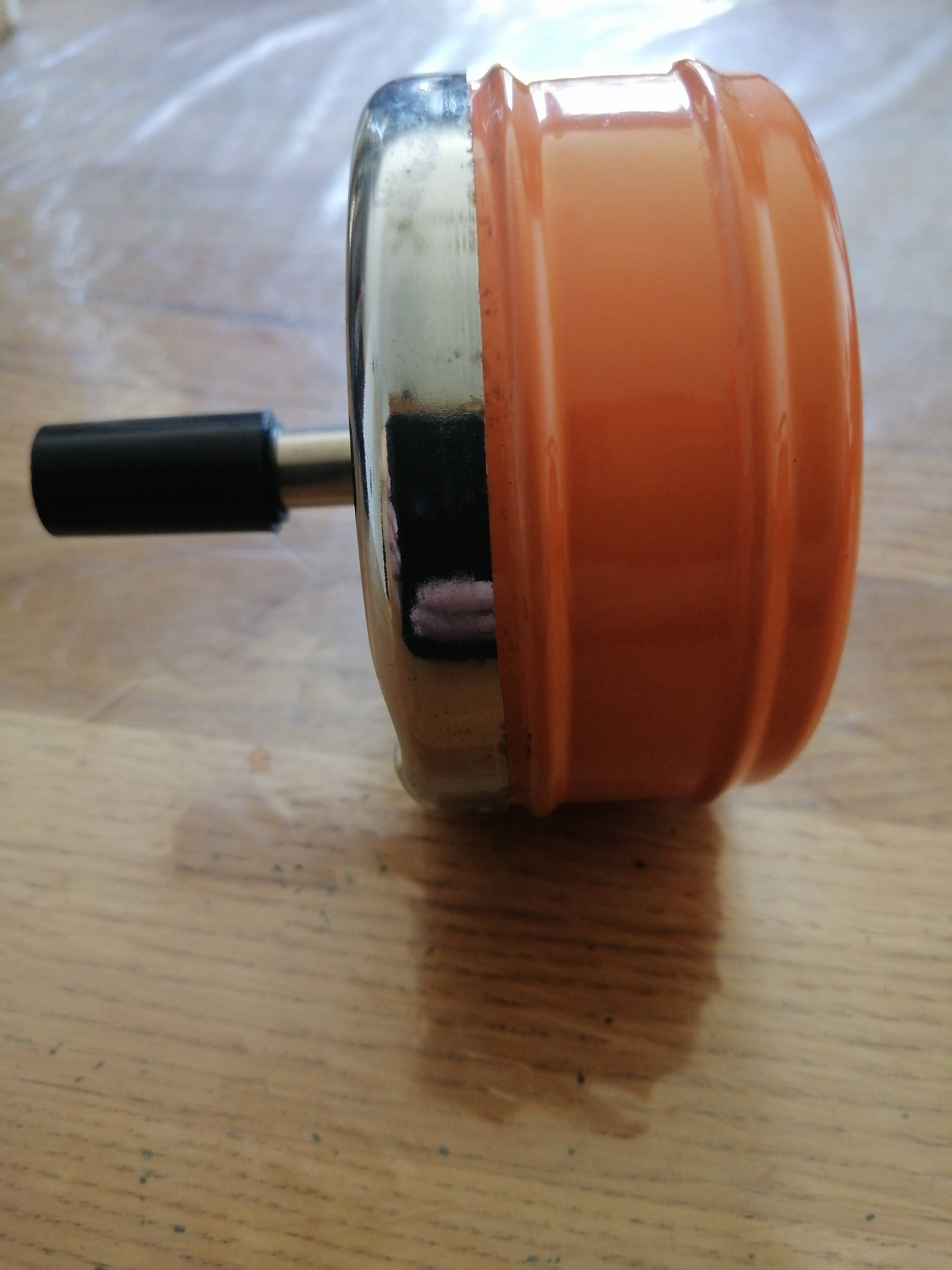 Vintage orange rotating ashtray