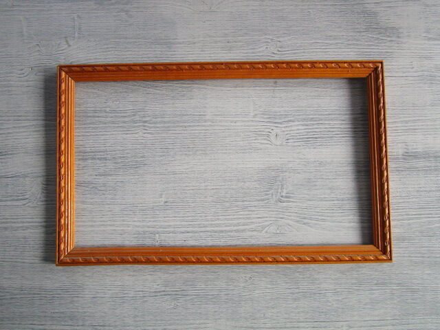 Old frame in worked wood