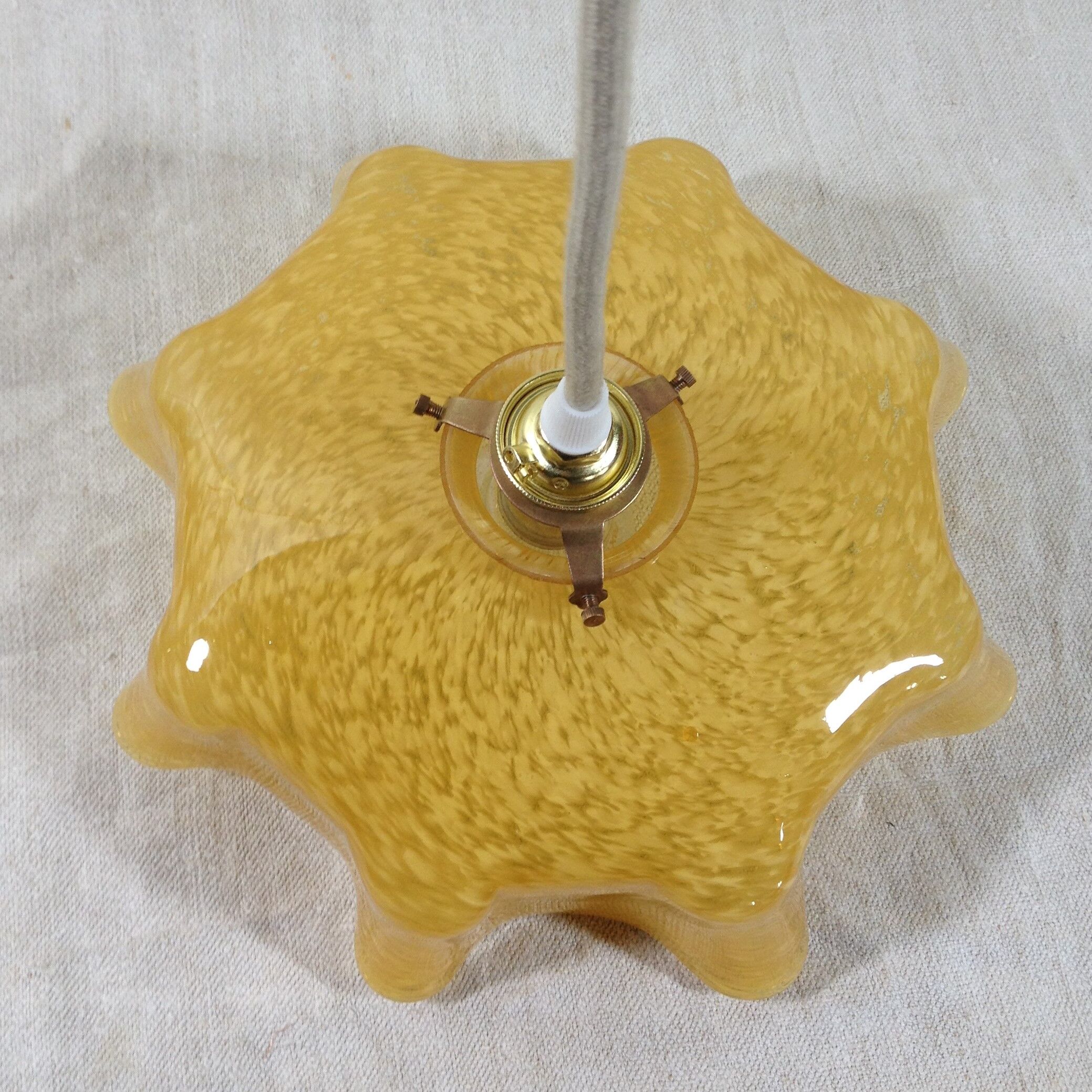 Hanging art deco glass of clichy yellow mustard