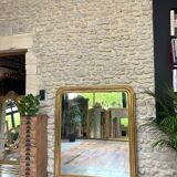 Louis-Philippe mantel mirror 133cm/115.5cm beaded gilded with gold leaf geometric decoration, late 19th century, heavily pitted and scratched glass, parquet on the back.