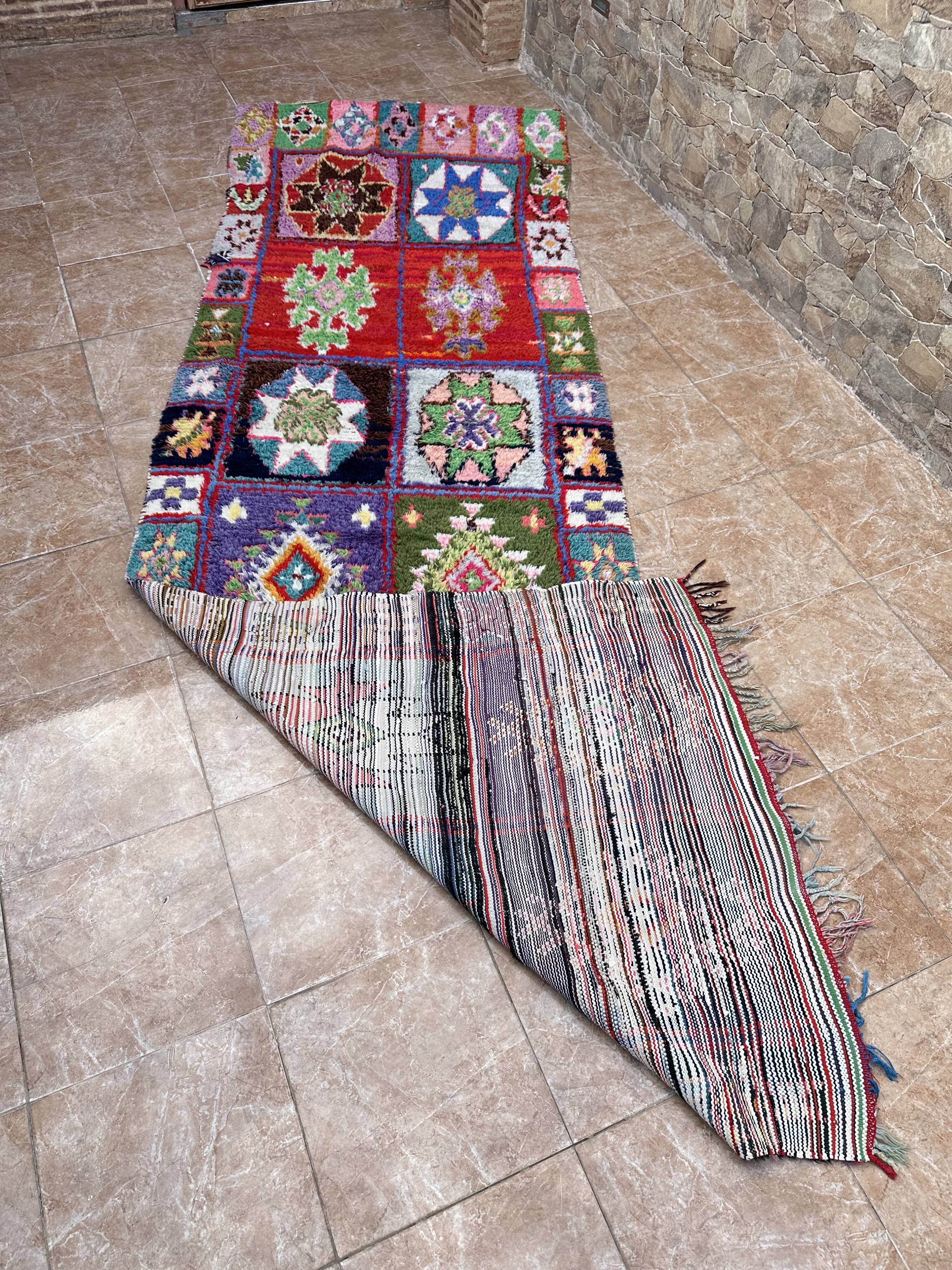 Vintage Boucherouite hallway rug: handwoven Berber rug.