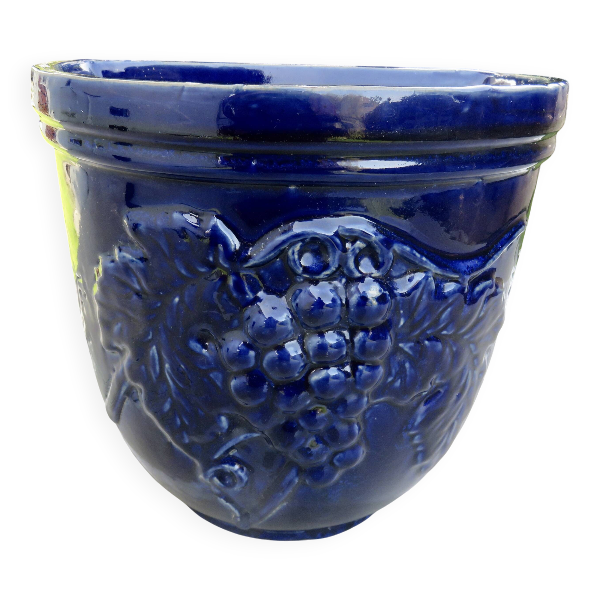 Wall pot in glazed blue terracotta with a grape motif, 1970s.