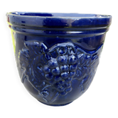 Wall pot in glazed blue terracotta with a grape motif, 1970s.