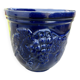 Wall pot in glazed blue terracotta with a grape motif, 1970s.