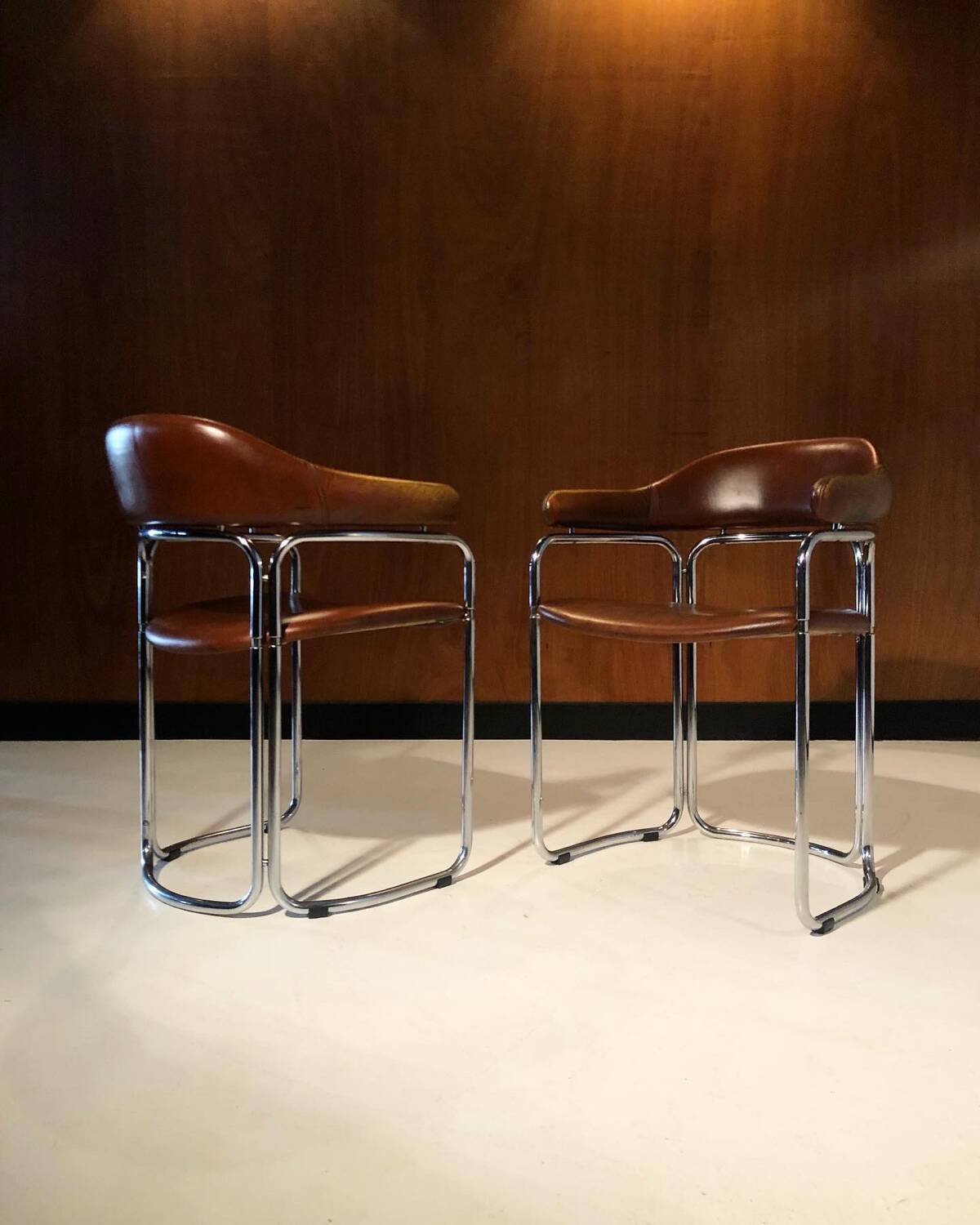 Pair of vintage armchairs, cognac leather and chrome steel 1970