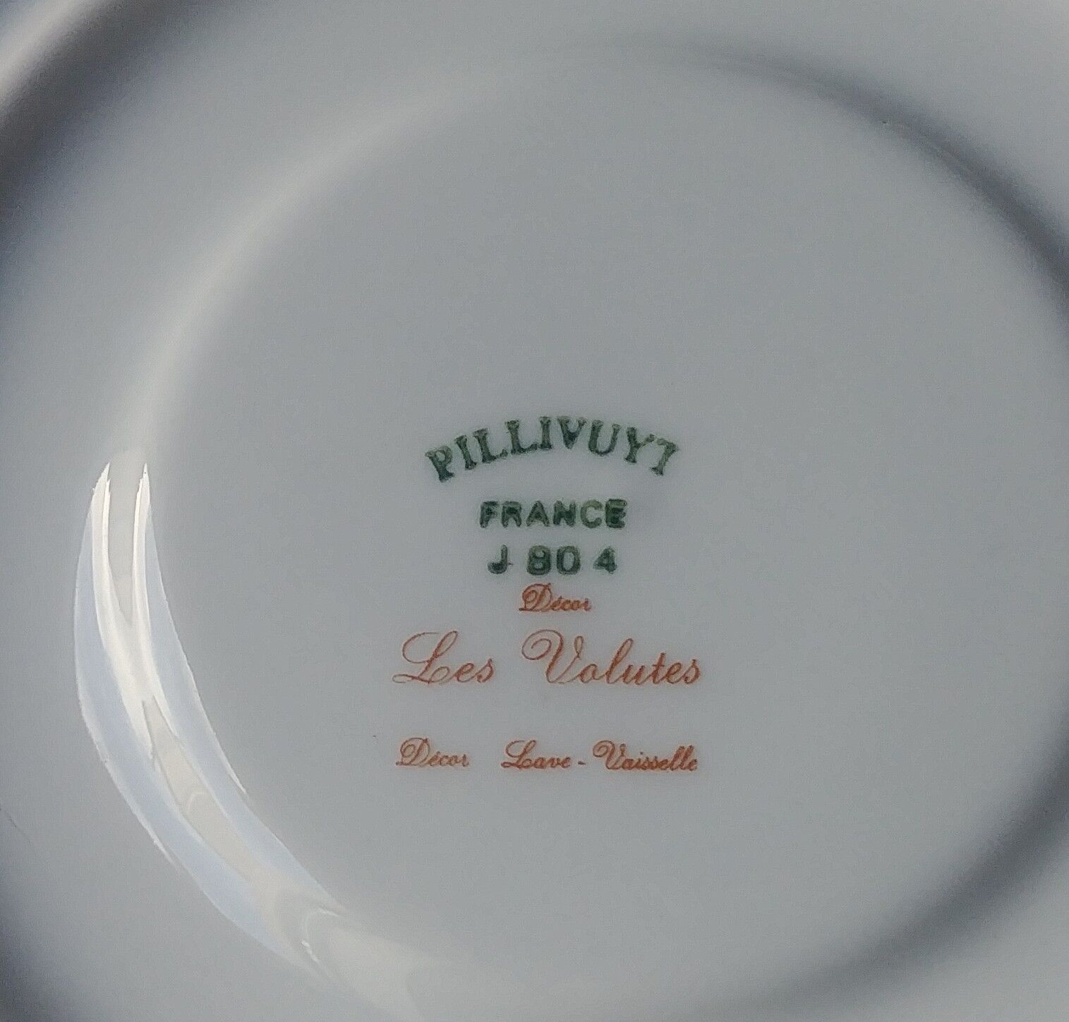 Two cups with herbal tea from the Faiencerie of Pillivuyt