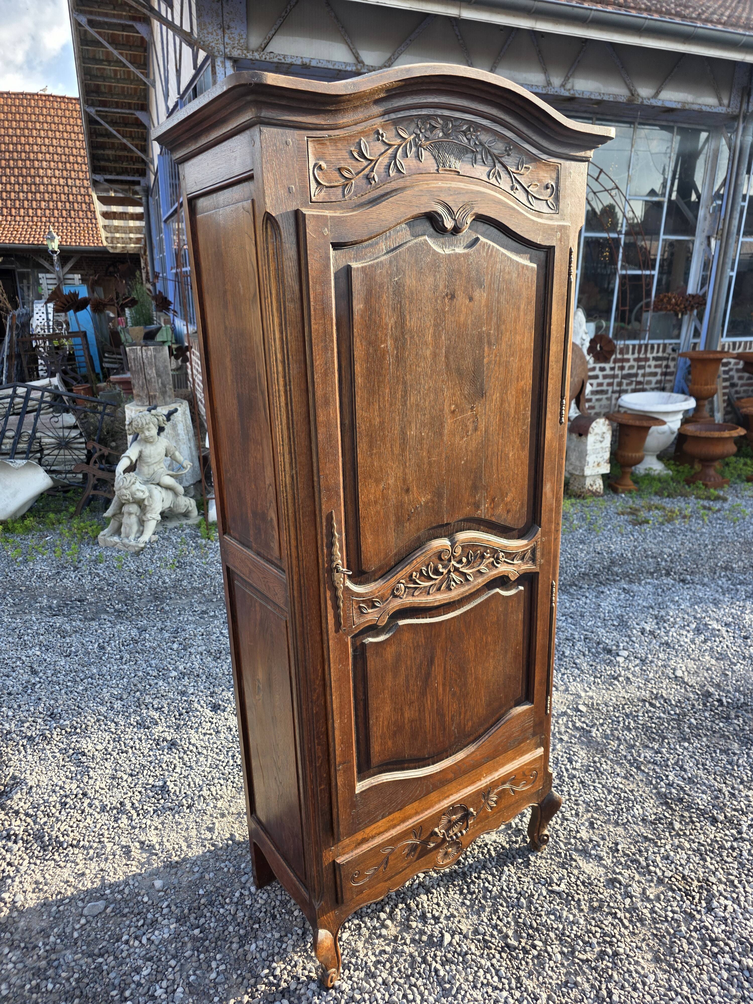 Louis XV style bonnetière in solid oak