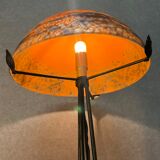 Contemporary mushroom lamp, wrought iron base and shaded orange glass shell