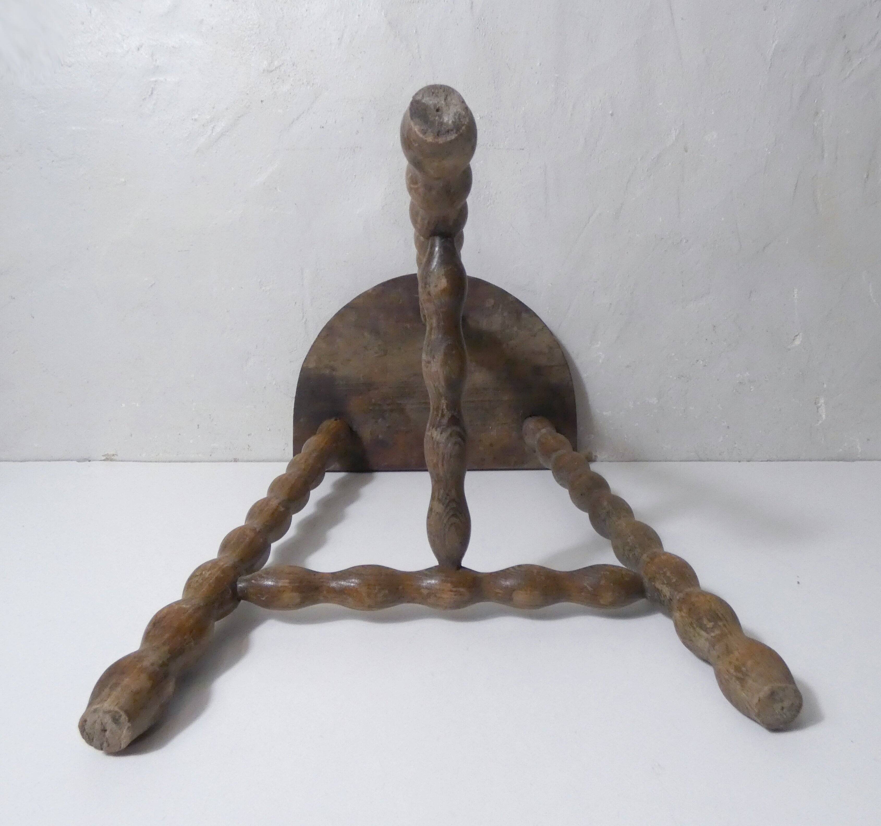 vintage half-moon tripod stool in turned solid wood with beaded edges